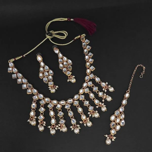 Slanted design necklaces-Kriaa Gold Plated White Kundan And Pearl Necklace Set With Maang Tikka - 1107981