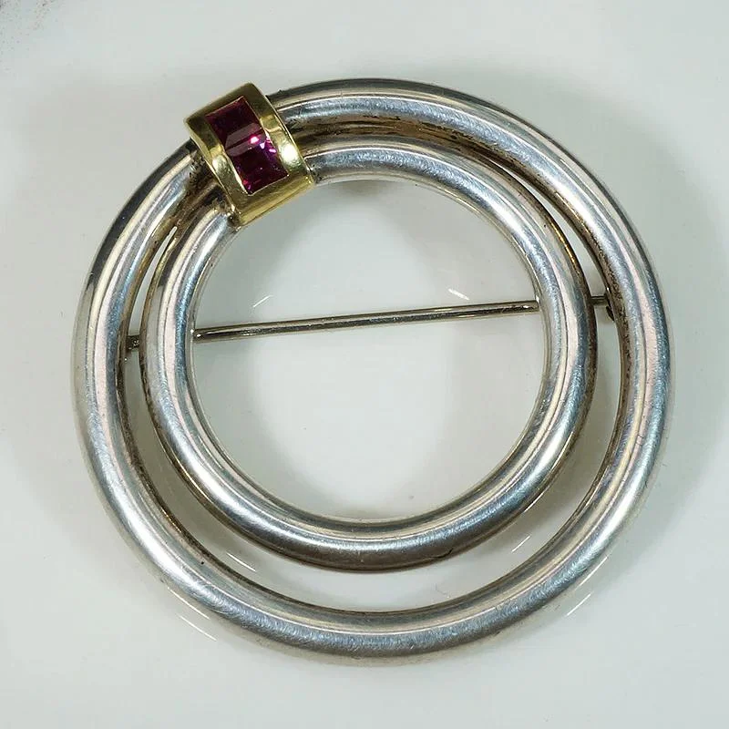 Full moon brooch-Luxurious Silver Circle Brooch with 18k & Ruby by Tiffany & Co.