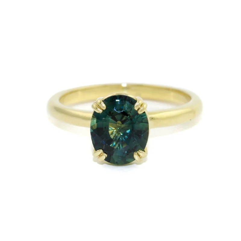 Tiered design rings-14 KT Gold Teal Sapphire Solitaire Ring