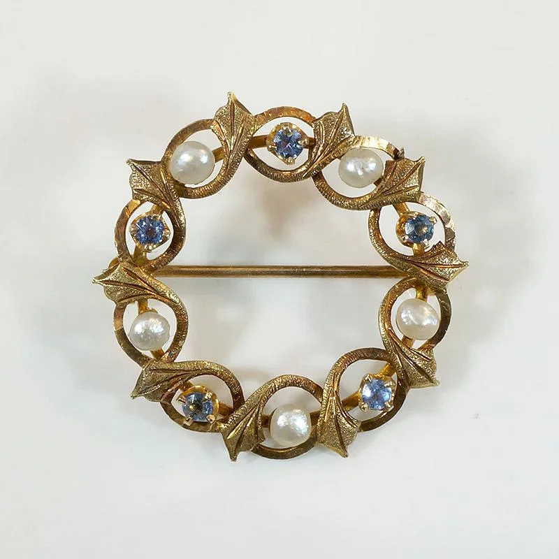 Flat twist brooch-Romantic Medieval Revival Sapphire & Pearl Circle Brooch