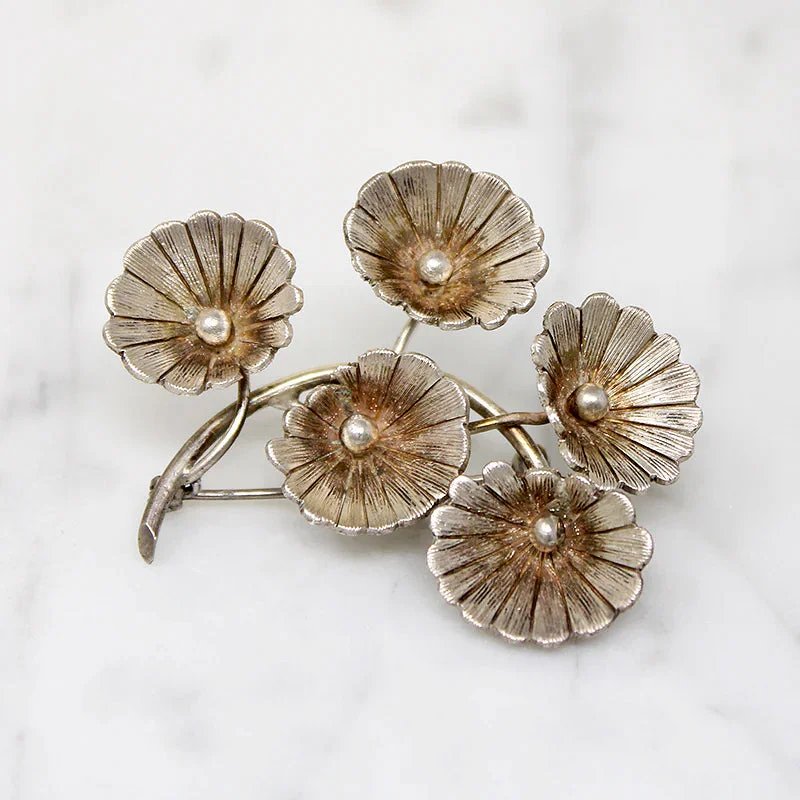 Sleek pin brooch-Jaunty Sprig of Flowers Brooch Signed Janna