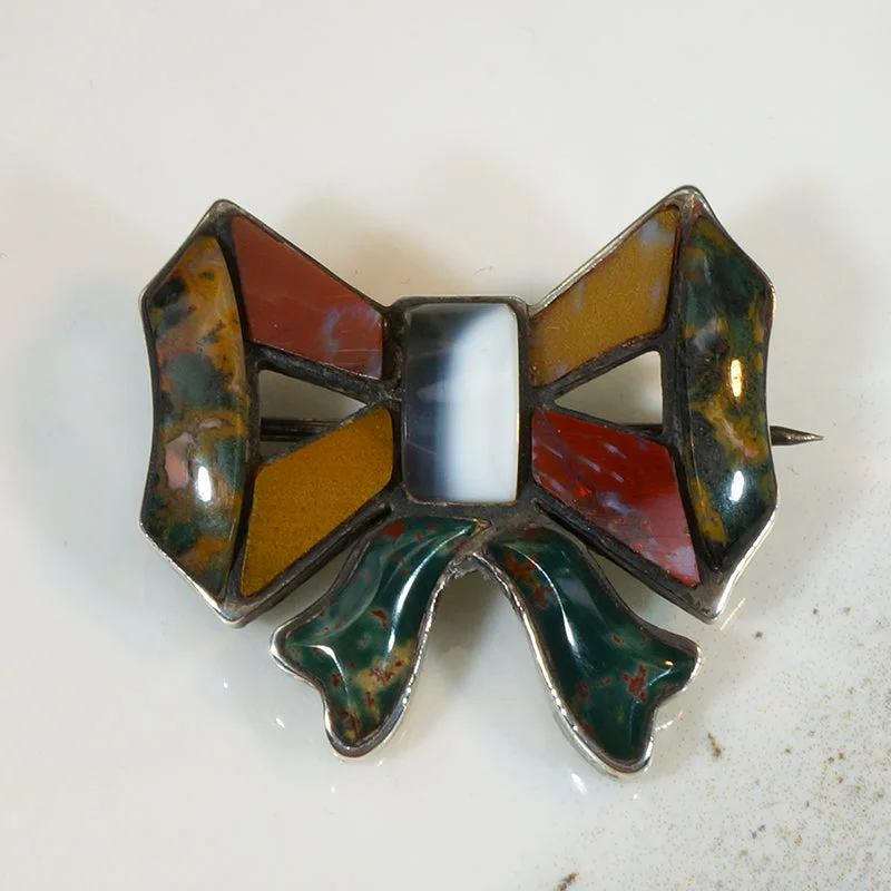 Smooth stone brooch-Sassy Little Parti-Colored Scottish Pebble Bow Brooch